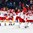 BUFFALO, NEW YORK - JANUARY 4: Denmark's Kasper Krog #31 is mobbed by teammates following their shootout victory over Belarus during the relegation round of the 2018 IIHF World Junior Championship. (Photo by Andrea Cardin/HHOF-IIHF Images)


